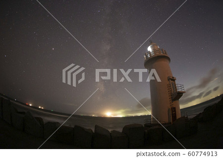 milky way with cape irago lighthouse 60774913