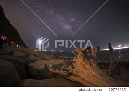 milky way with cape irago lighthouse 60774915