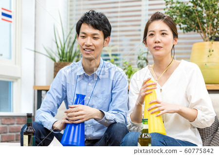 Watch sports on TV and support the couple 60775842