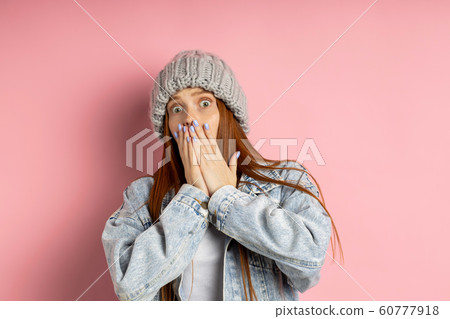 Portrait of excited young woman dressed denim 60777918