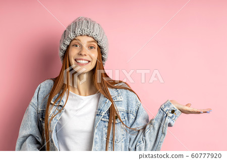 Portrait of excited young woman dressed denim 60777920