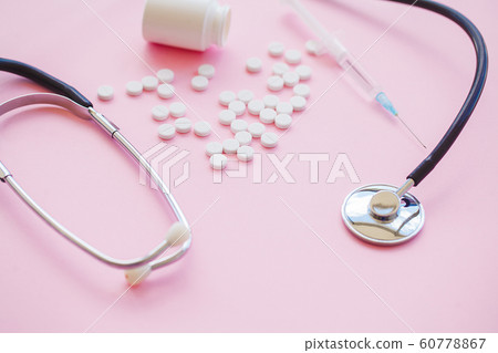 Close up of pills. Dietary supplements. Variety pills. Vitamin capsules on pink background 60778867