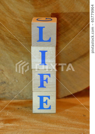 Life. Wooden cubes with blue letters Life. Wooden cubes with blue letters 60779964