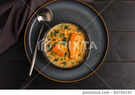 Salmon creame soupe in bowl 60780195