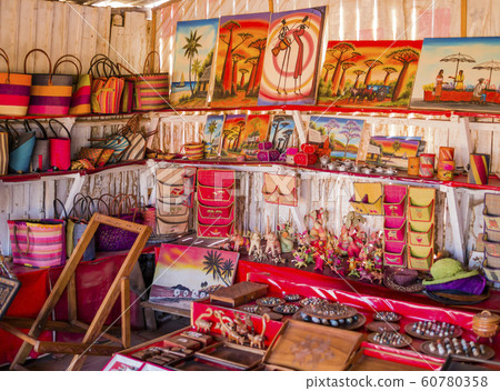 Multicolored market stall with handmade souvenirs, Antananarivo, Madagascar 60780358