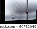 Broken window glass 60782049