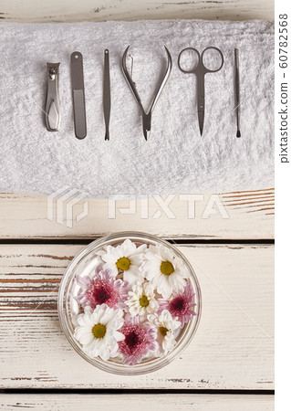 Tool for manicure on white towel. Tool for manicure on white towel. 60782568