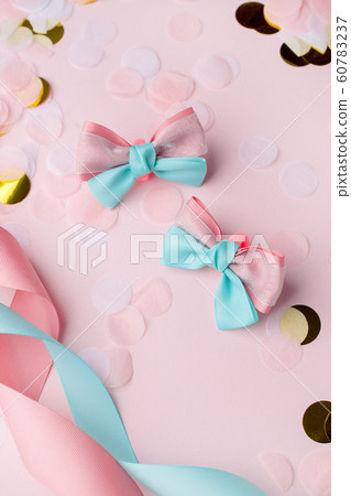 Set of baby accessories for hair on a pink pastel Set of baby accessories for hair on a pink pastel 60783237