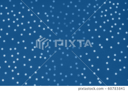 Metallic foil snowflakes confetti sparse on trendy 60783841