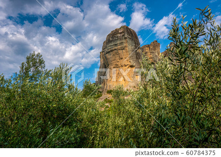 Green deciduous trees and mountain in Greece 60784375