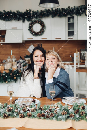 Happy mother and daughter staying together in the 60784647