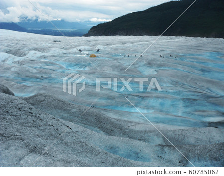 Two Helicopters, Tent And A Dozen Of Hikers On Mendenhall Glacier, Alaska 60785062