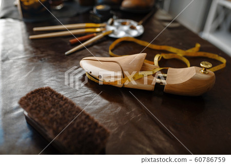 Shoemaker occupation, footwear repair concept 60786759