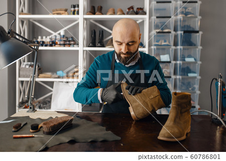Shoemaker fix the shoe, footwear repair, cobbler 60786801