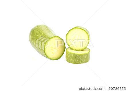 Green ripe squash cut into slices isolated on a white background. 60786853