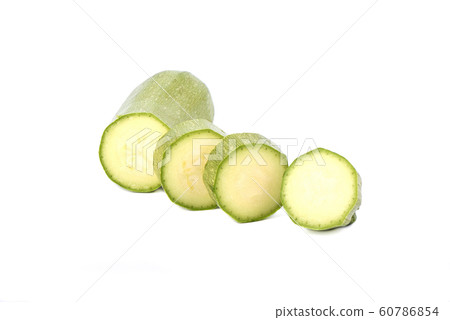 Green ripe squash cut into slices isolated on a white background. Green ripe squash cut into slices isolated on a white background. 60786854