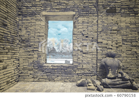 Ruined Buddha image in ancient Buddhist temple 60790158