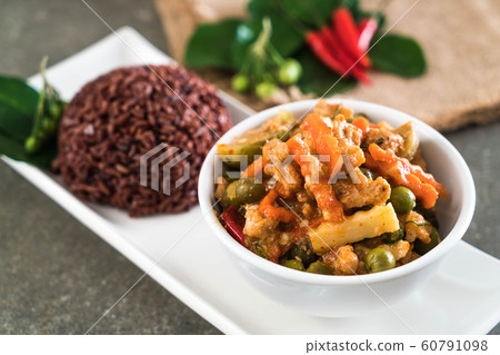 Panaeng Curry with pork and berry rice Panaeng Curry with pork and berry rice 60791098