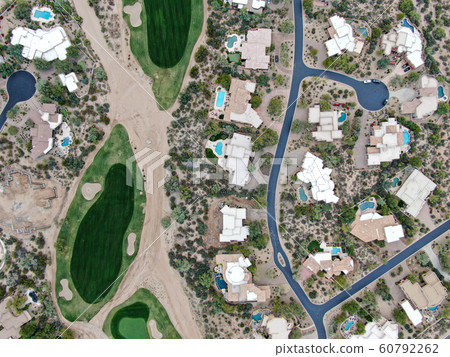 Aerial view above golf course and luxury villas, Scottsdale 60792262