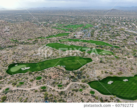 Aerial view above golf course and luxury villas, Scottsdale Aerial view above golf course and luxury villas, Scottsdale 60792272