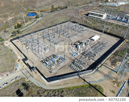 High voltage power electric station with dry mountain background 60792280