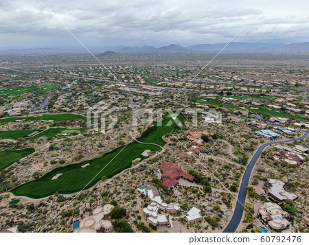 Aerial view above golf course and luxury villas, Scottsdale 60792476