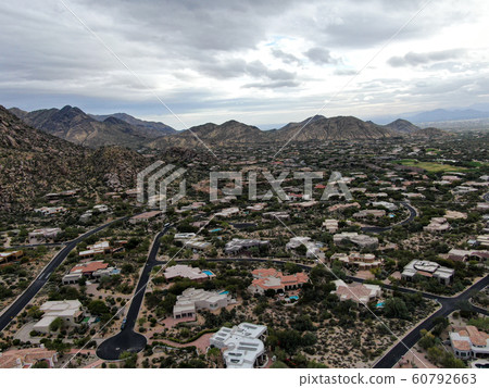 Aerial view of luxury villas and mountain, Scottsdale Aerial view of luxury villas and mountain, Scottsdale 60792663