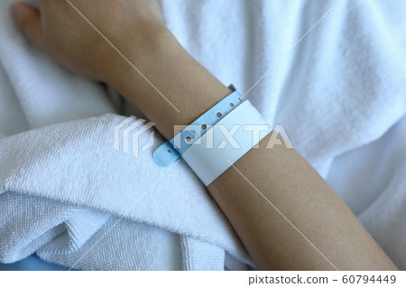 wristband id blank name tags on arm patient 60794449