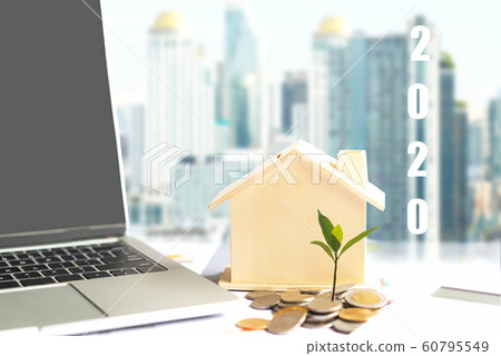 2020 New year on growing up money coin stack for investment 60795549