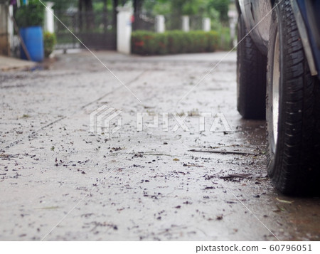 wet rustic grunge and dirty urban street floor after heavy rain and in tropical country crop closeup waiting for cleaning work wet rustic grunge and dirty urban street floor after heavy rain and in tropical country crop closeup waiting for cleaning work 60796051