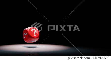 Question Mark Dice Spotlighted on Black Background 60797075