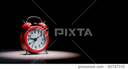 Alarm Clock Spotlighted on Black Background 60797145