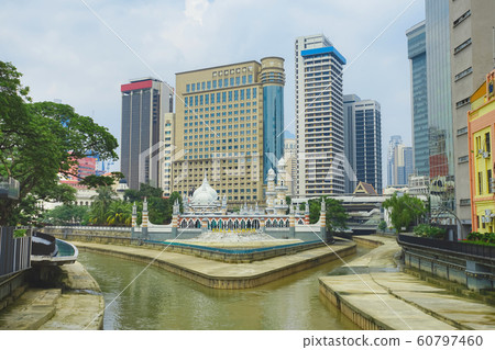 Masjid Jamek and the high buidlings background. Masjid Jamek and the high buidlings background. 60797460