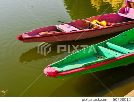 Wooden boats waiting for tourists Wooden boats waiting for tourists 60798013