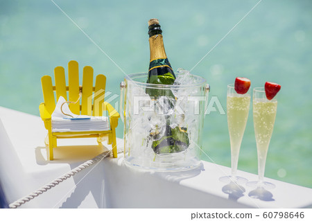 Champagne on board a pleasure boat on the background of the blue Caribbean sea 60798646