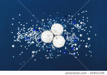 Christmas white baubles collection on blue glitter Christmas white baubles collection on blue glitter 60802206