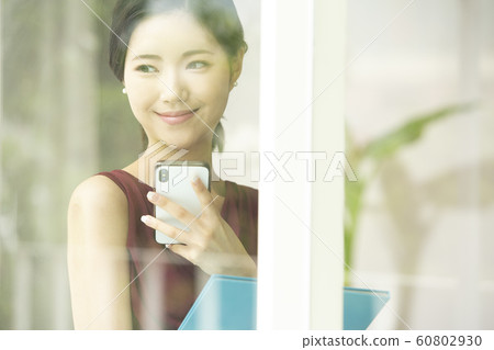 Woman business smartphone Woman business smartphone 60802930