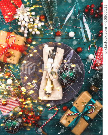 Christmas dark green background with tableware 60803113