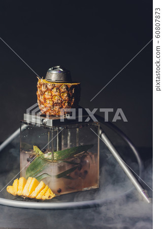 Shisha With Fruit Bowl With Colorful Smoke In Hookah Bar Closeup. Shisha With Fruit Bowl With Colorful Smoke In Hookah Bar Closeup. 60807873