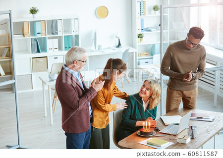 Celebrating birthday at office 60811587