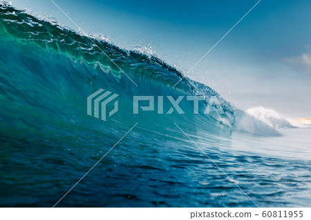 Blue crystal wave in ocean. Breaking wave and sun light 60811955