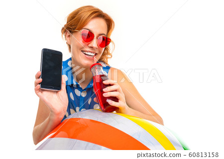resting smiling girl with sunglasses with a phone with a mockup on a white background resting smiling girl with sunglasses with a phone with a mockup on a white background 60813158