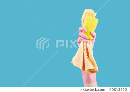 Hand with microfiber cloth and sponge Hand with microfiber cloth and sponge 60813350