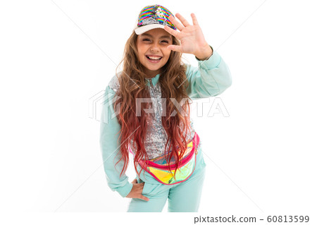 Little pretty caucasian girl in a tracksuit waving hand, picture isolated on white background 60813599