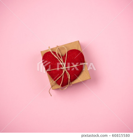 Red heart with a gift for Valentine's Day 60815580