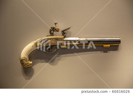 Flintlock pistol in gallery of a museum Flintlock pistol in gallery of a museum 60816026