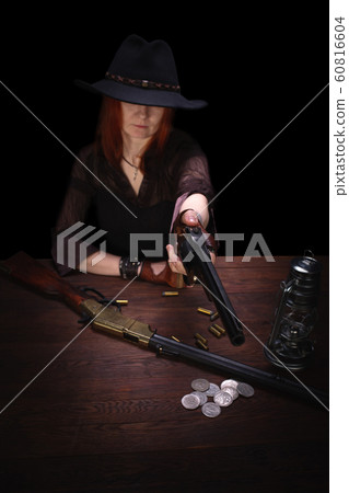 wild west girl shooting from revolver gun wild west girl shooting from revolver gun 60816604