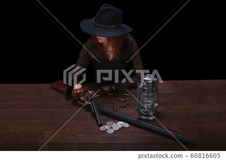 wild west girl shooting from revolver gun wild west girl shooting from revolver gun 60816605