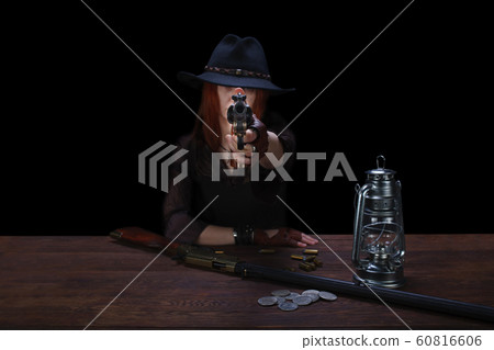 wild west girl shooting from revolver gun wild west girl shooting from revolver gun 60816606