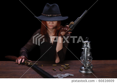 wild west girl shooting from revolver gun wild west girl shooting from revolver gun 60816609